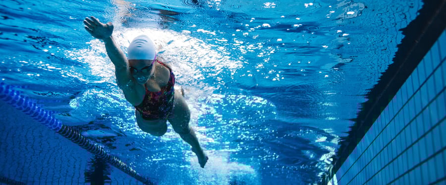 professional swimmer in pool